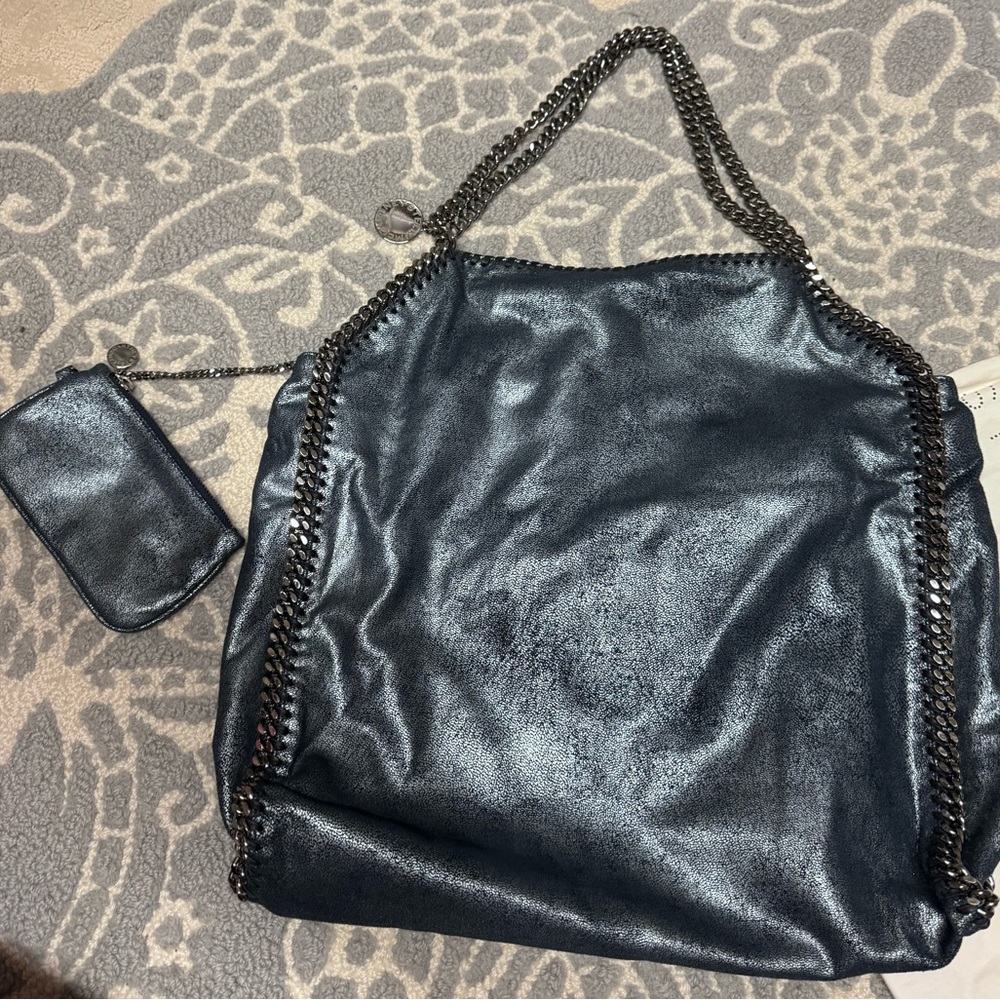 Large Stella McCartney gently used metallic navy blue tote for sale!
